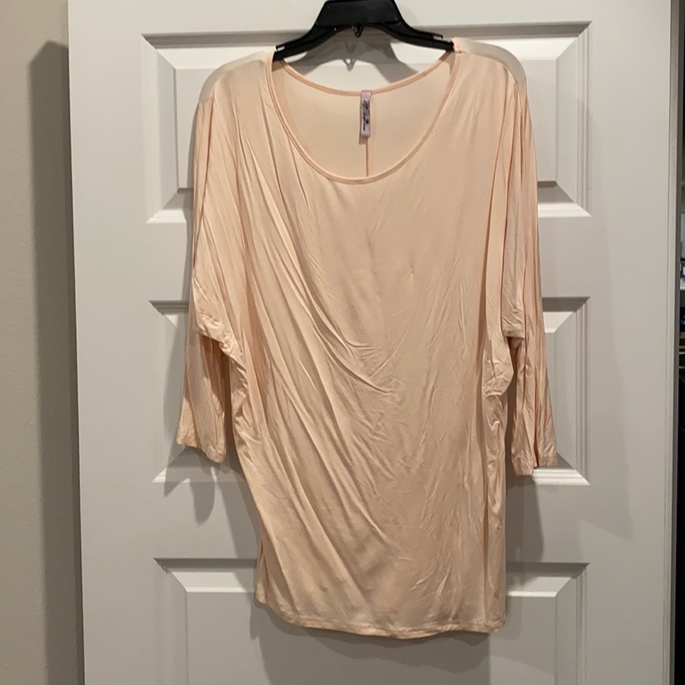 Pink tunic. Size medium.